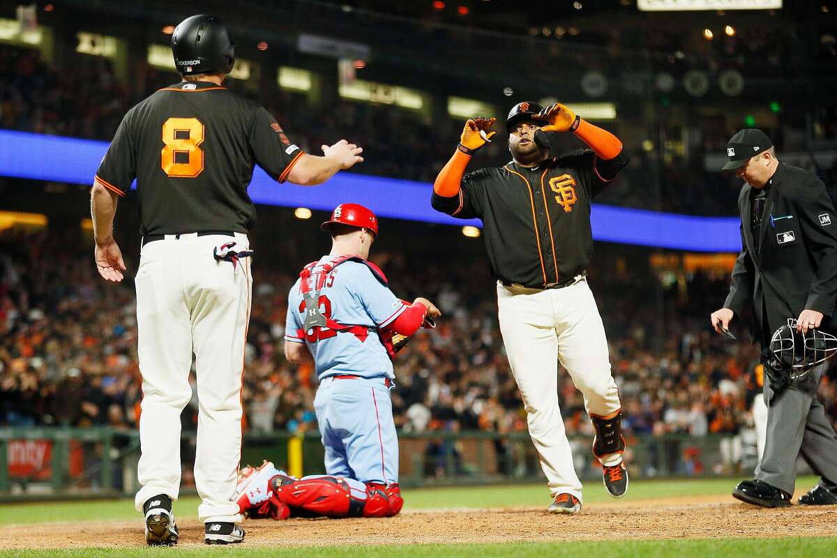 San Francisco Giants Pablo Sandoval (48) celebrates his two-run home run with Giants Alex Dickerson (8) in the 7th inning of an MLB game against the St. Louis Cardinals at Oracle Park on Saturday, July 6, 2019, in San Francisco, Calif.