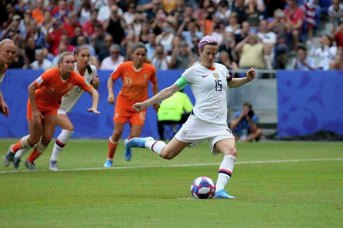United States' Megan Rapinoe scores her side's opening goal from a penalty shot during the Women's World Cup final soccer match between US and The Netherlands at the Stade de Lyon in Decines, outside Lyon, France, Sunday, July 7, 2019.