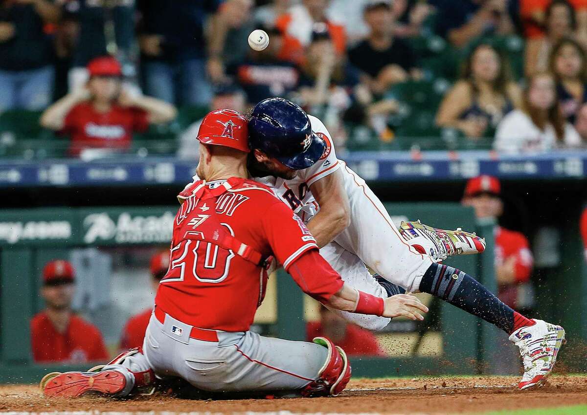Harrowing collision at home plate casts shadow over Astros' win against  Angels