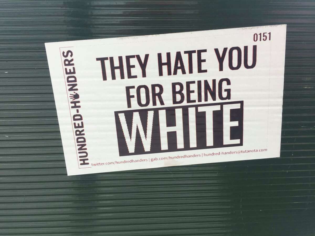 White supremacist stickers plastered around downtown Troy