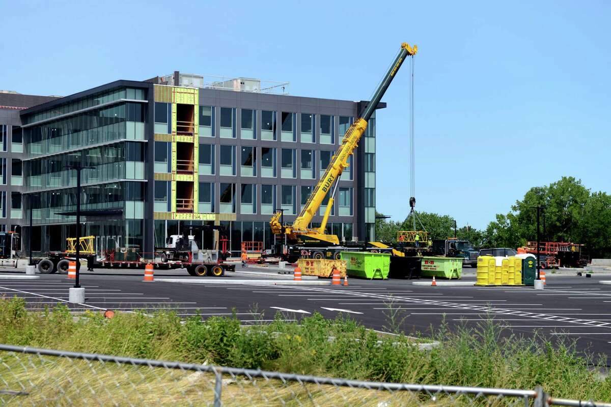Construction site for the new Ayco headquarters on Monday, July 8, 2019, off of Route 9 in Colonie, N.Y. Ayco is the latest to install solar panels over its planned parking lot. The project will go before Colonie's planning board Tuesday evening. (Catherine Rafferty/Times Union)