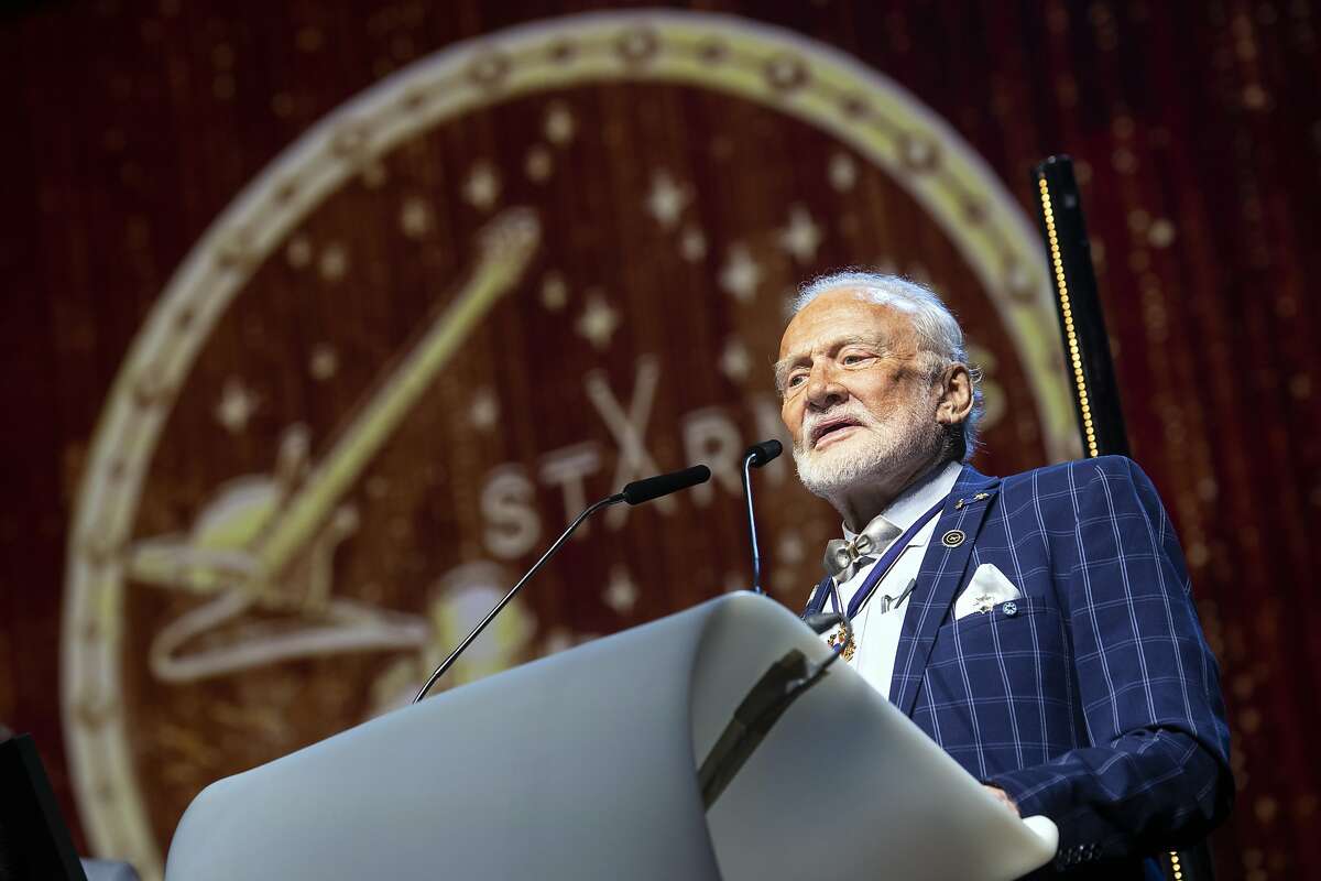 In this photo taken on Monday, June 24 2019, U.S Astronaut Buzz Aldrin speaks after receives the Lifetime Achievement Award of Stephen Hawking Medal for Science Communication, during the official opening of the Starmus Festival 'Once Upon a Time on the Moon' in Zurich, Switzerland. The 2019 Starmus Festival celebrates mankind's first step on the Moon, coinciding with the 50th anniversary. (Ennio Leanza/Keystone via AP)