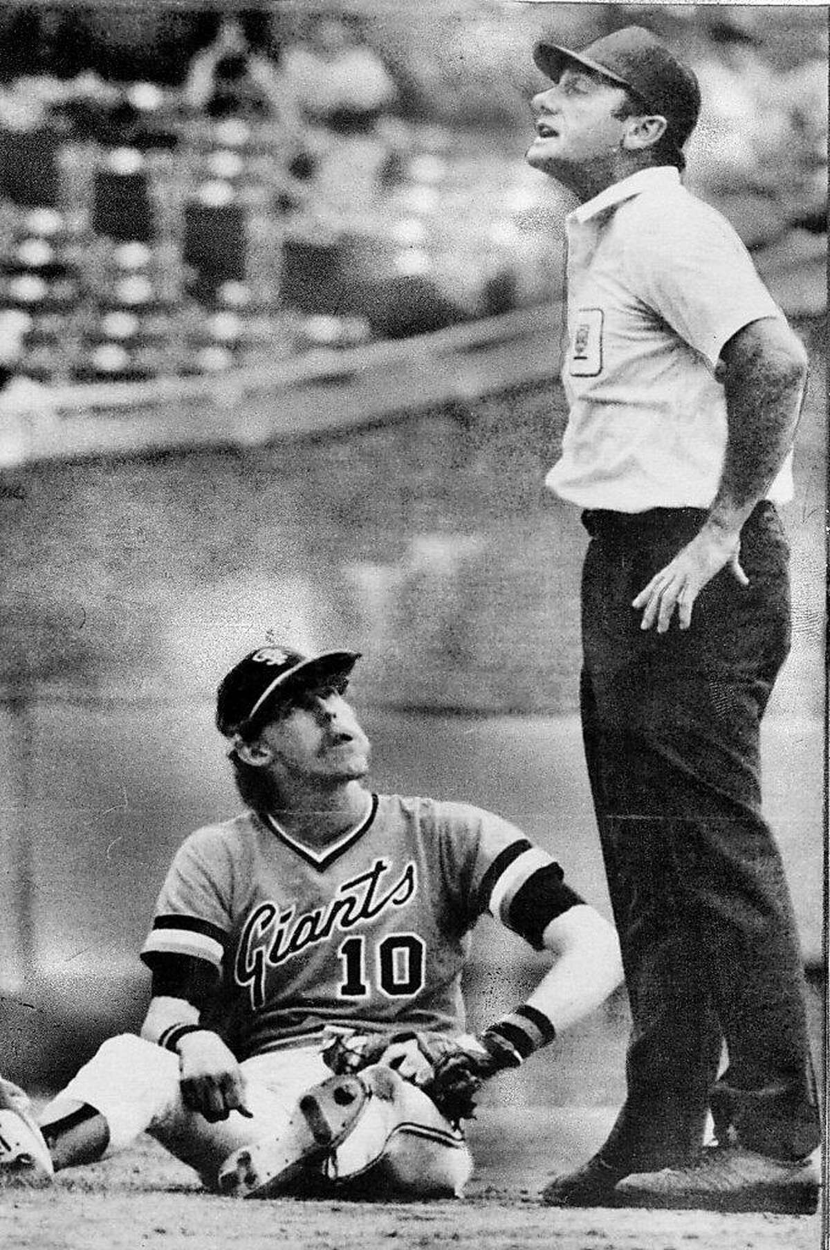 San Francisco shortstop Johnnie LeMaster disputes call at second base with second base umpire Andy Olsen in the fourth inning of game with Chicago Cubs in Chicago.