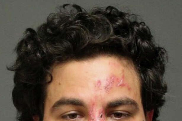 A mugshot of John Rodas from 2015 after he was arrested for  second-degree threatening and disorderly conduct. He turned up in Ridgefield Sunday morning — naked, coming out of the woods near Route 7, and hoping into the bed of a pickup truck. He eventually jumped from the truck as it was moving and sustained life-threatening head injuries.