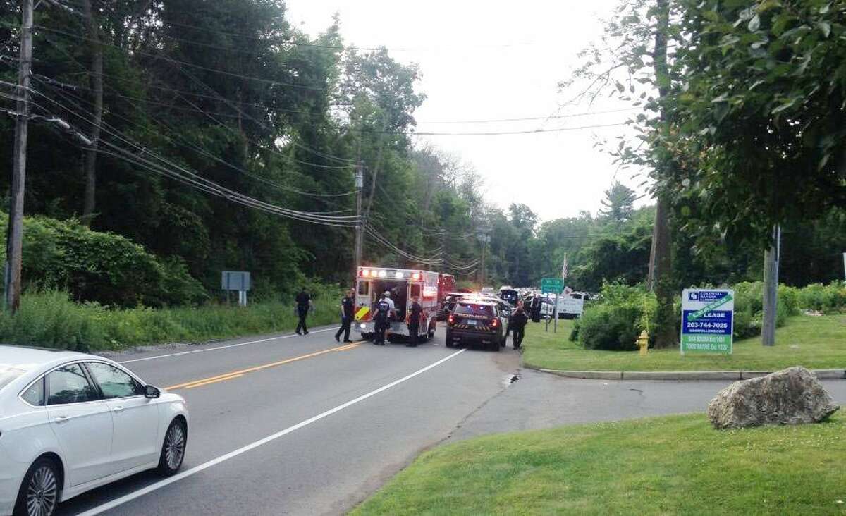 Traffic backed up on Route 7 in Ridgefield early Sunday morning after a naked man from New York jumped into the back of a pickup truck. The man later jumped from the truck while it was moving, resulting in significant head injuries. — Susan Schultz/Hearst Connecticut Media photo