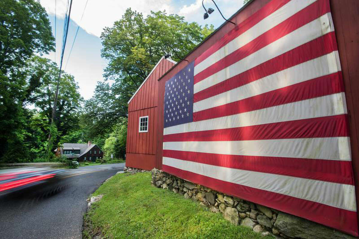 A U.S. flag is prominently displayed on Belden Hill Road in Wilton. —Bryan Haeffele/Hearst Connecticut Media