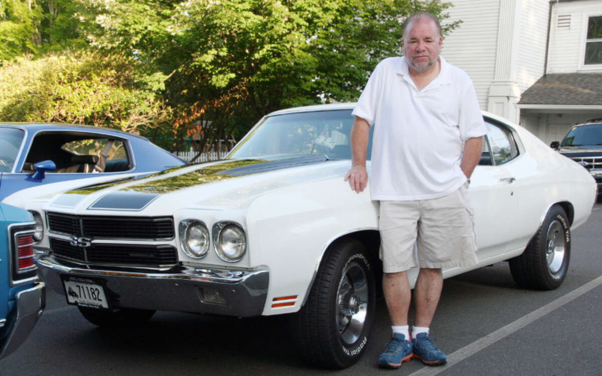 Memory Lane Cruisers member David Coles with his 1970 Chevrolet Chevelle. —Nicholas Martinez photo