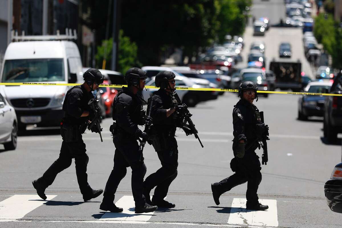 Members of the San Francisco Police Department move through the intersection of 16th Street and Rhode Island Street in response to a report of gunfire at 350 Rhode Island in San Francisco on Monday, May 20, 2019. California Senate Senators voted nearly unanimously to approve a bill, AB 392, that would give California one of the tightest laws in the nation regulating police use of force. It passed after supporters and police reached a compromise in the state Assembly six weeks earlier.