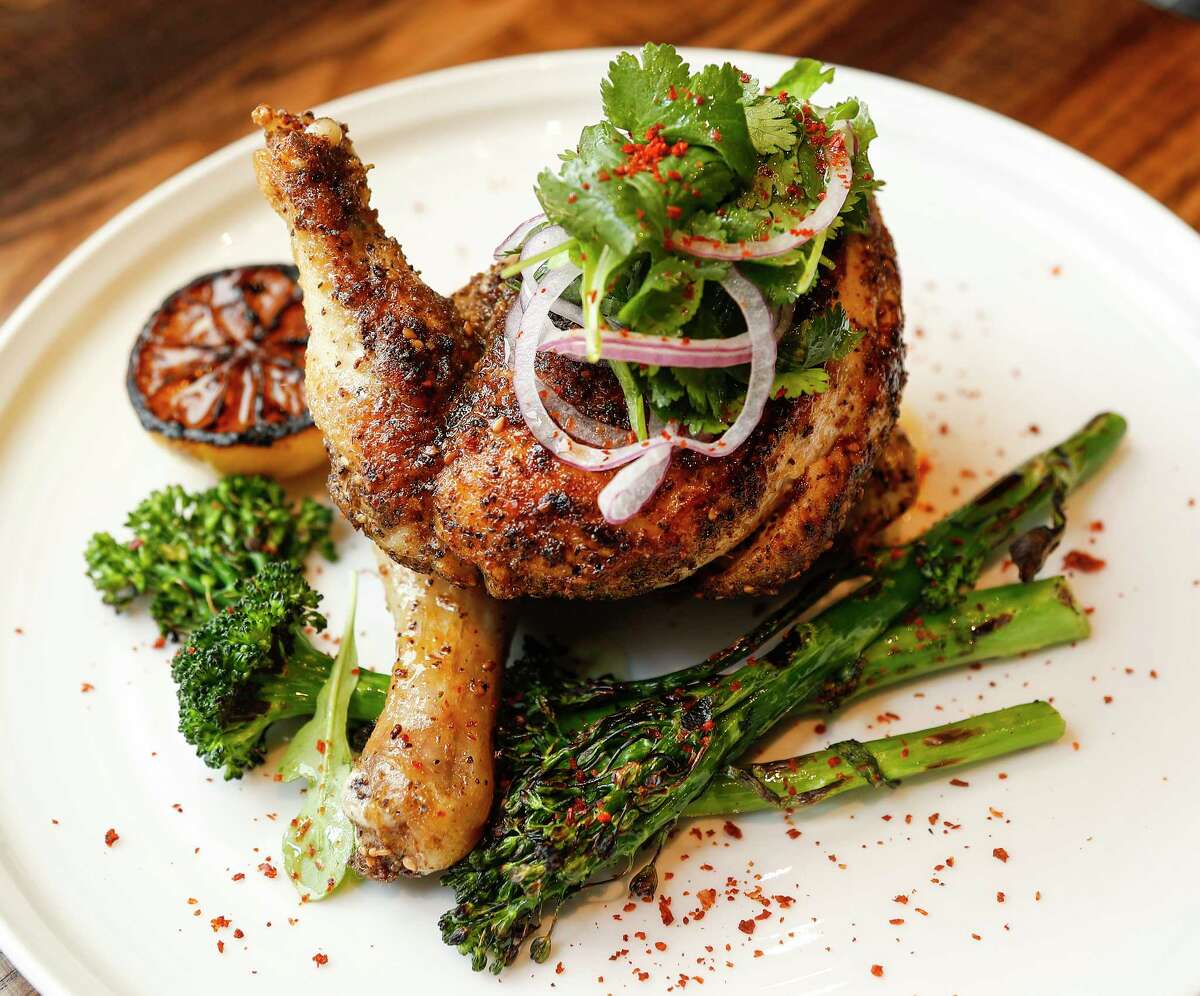 Za'atar-roasted chicken with grilled broccolini, cilantro salad and Aleppo pepper at Warehouse 72.
