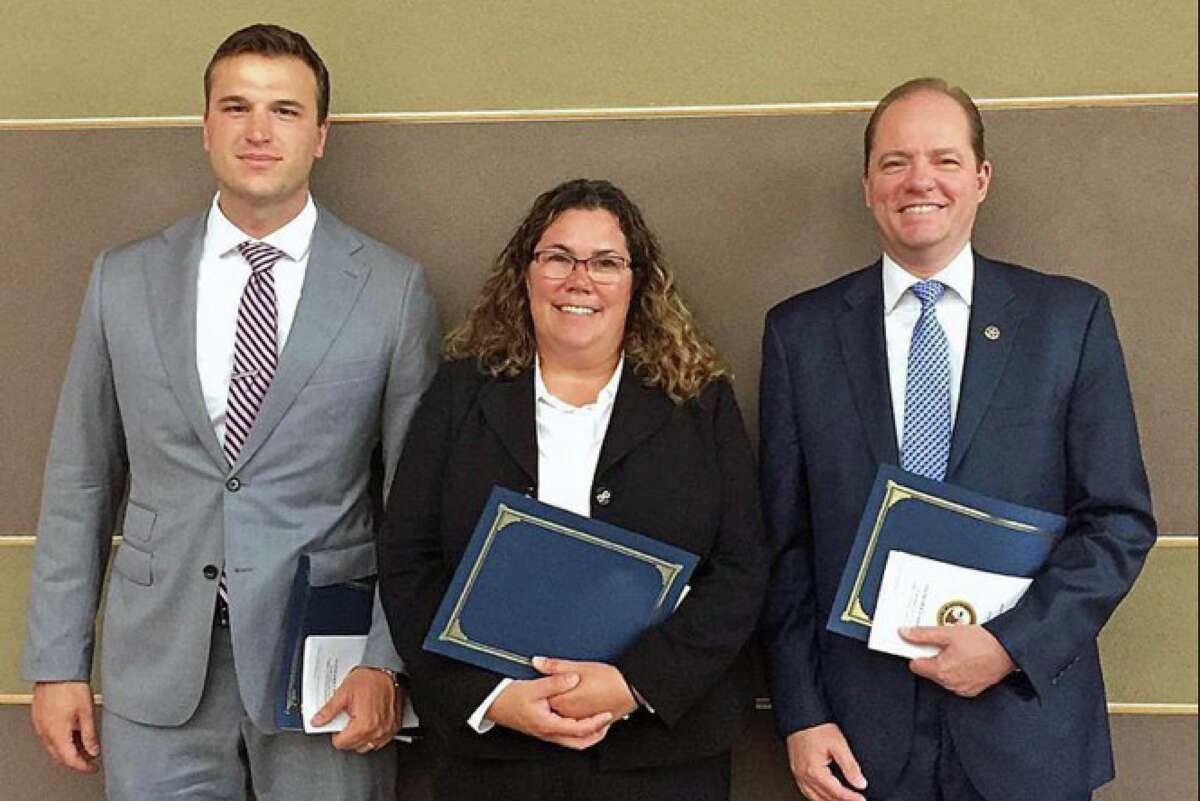 Special Agent Thomas Lipp, left, Detetective Elizabeth DiIorio and Senior Special Agent Michael Sweeney.