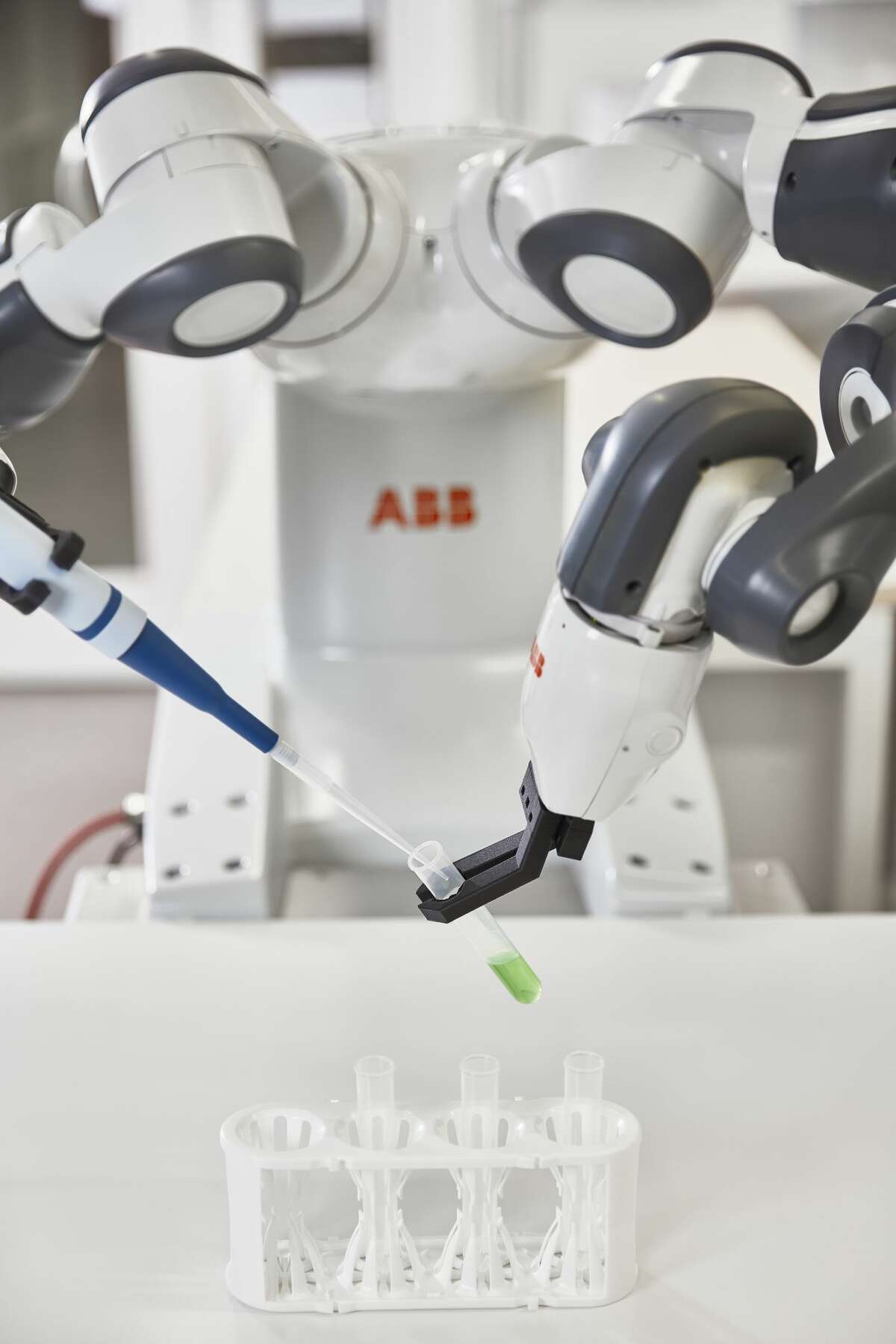 Pictured is an ABB robot. The Switzerland-based company will open a 5,300-square-foot robotics research and development facility at the Texas Medical Center Innovation Institute. Its non-surgical robots could be programmed to do repetitive, time-consuming tasks, such as measuring medications in the proper dosage and assembling sterile instrument kits used by surgeons. 