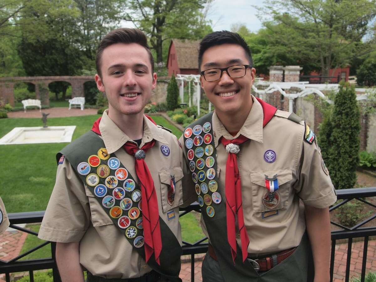 Boy Scouts from Troop 76 Clay Vaughan, left, and Thomas Vilinskis, right, became Eagle Scouts last month. The distinction requires that a scout earn 21 merit badges, serve in a leadership position and complete a significant community project.