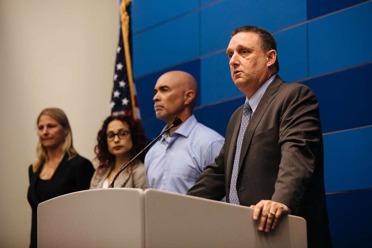San Francisco Police Department's Commander of the Investigations Bureau, Greg McEachern, right, addresses the press about the arrest of serial rapist, Orlando Vilchez Lazo, during a press conference at the San Francisco Police Department in San Francisco, Calif., on Friday, July 13, 2018.