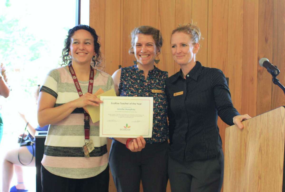 Jennifer Humphrey, a teacher at Nimitz Middle School, received the Secondary Teacher of the Year Award from EcoRise, an Austin-based nonprofit. Director of programs Abby Randall and Texas program manager Kristi Hibler-Lutton presented the award at the San Antonio Student Sustainability Showcase.
