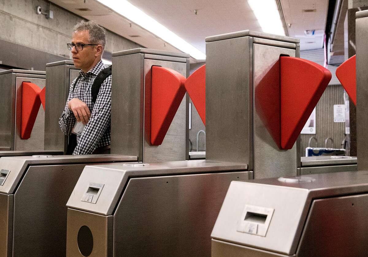 Commuters make their way through a new prototype fare gate at the Richmond BART Station in Richmond, Calif. Tuesday, July 9, 2019.