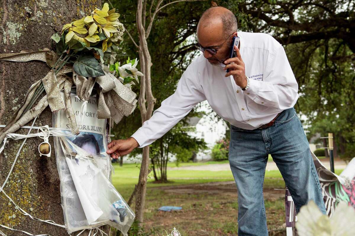 Prairie View Mayor David Allen visits the makeshift memorial dedicated to Sandra Bland, just outside the gates of Prairie View A&M, on Wednesday, June 26, 2019, in Prairie View.