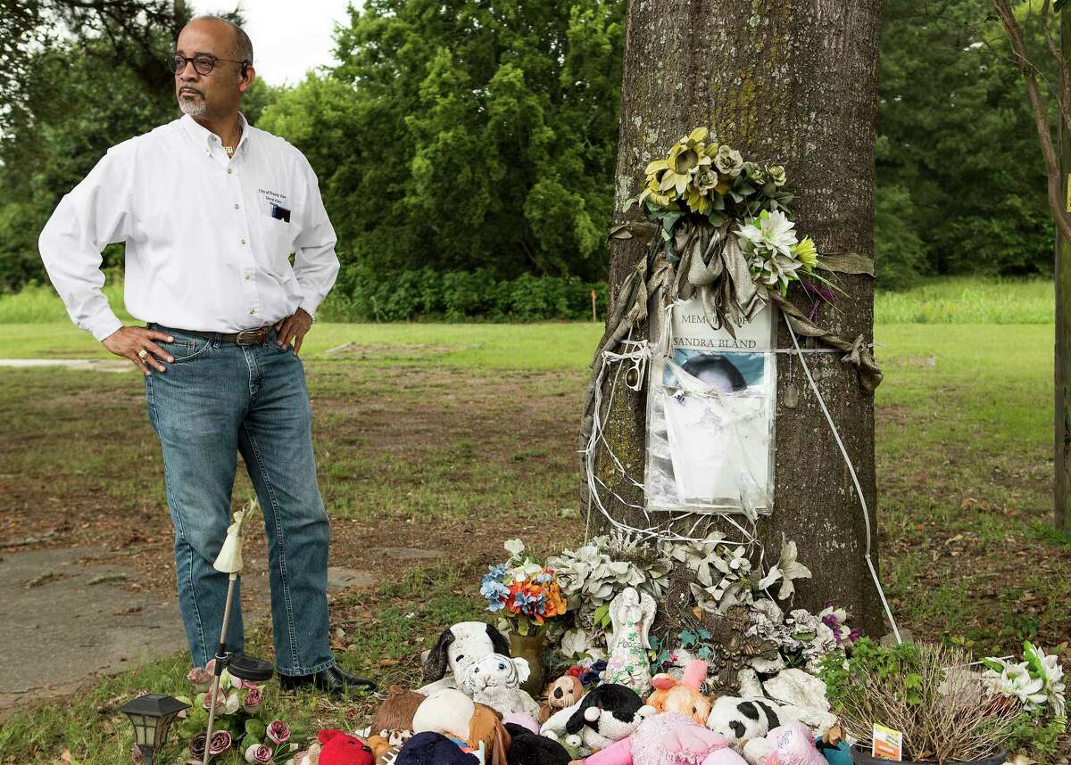Prairie View Mayor David Allen visits the makeshift memorial dedicated to Sandra Bland, just outside the gates of Prairie View A&M, on Wednesday, June 26, 2019, in Prairie View.