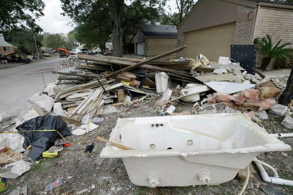 Debris is shown in Bear Creek Wednesday, Nov. 15, 2017, in Houston. ( Melissa Phillip / Houston Chronicle )