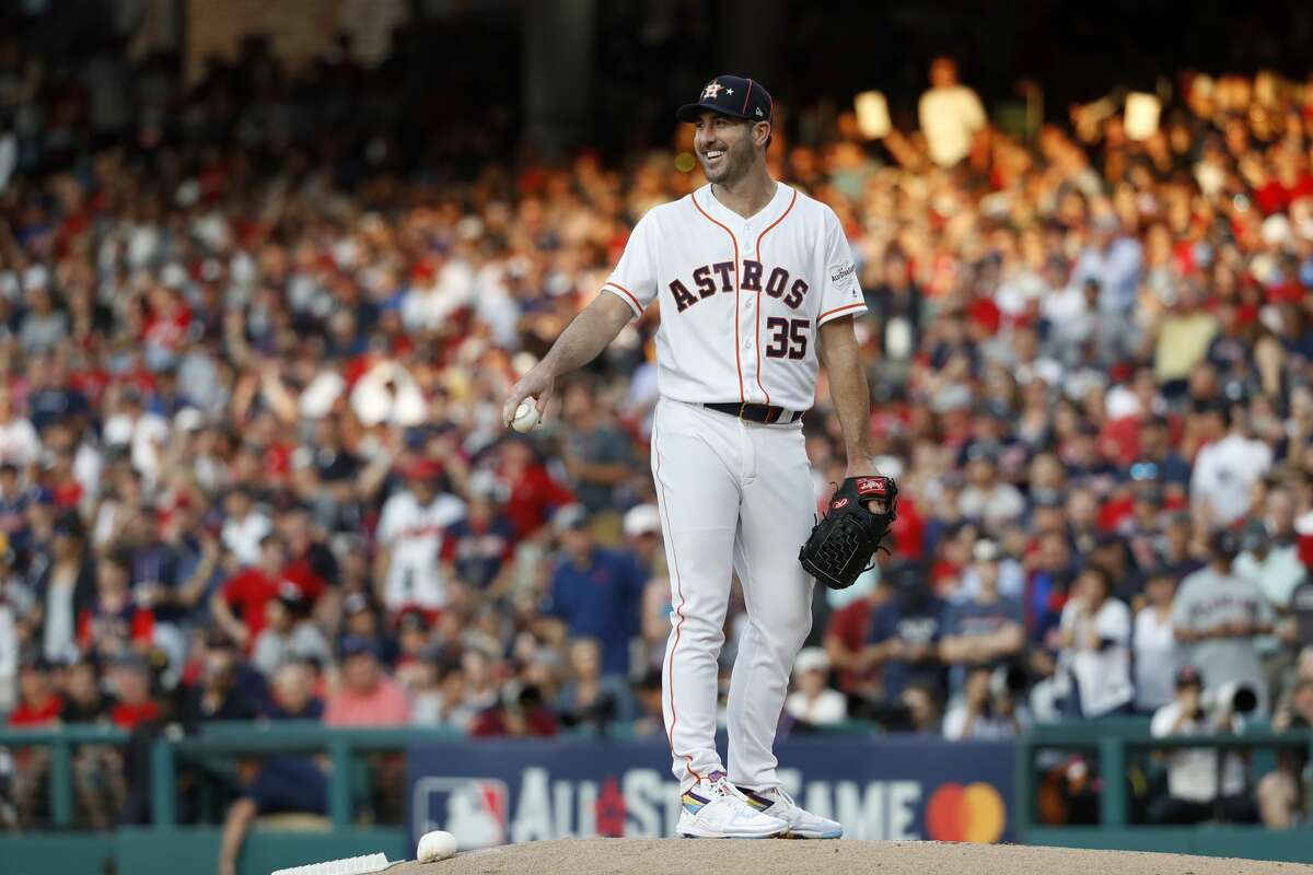 American League starting pitcher Justin Verlander, of the Houston Astros, smiles on the mound during the first inning of the MLB baseball All-Star Game against the National League, Tuesday, July 9, 2019, in Cleveland. (AP Photo/John Minchillo)