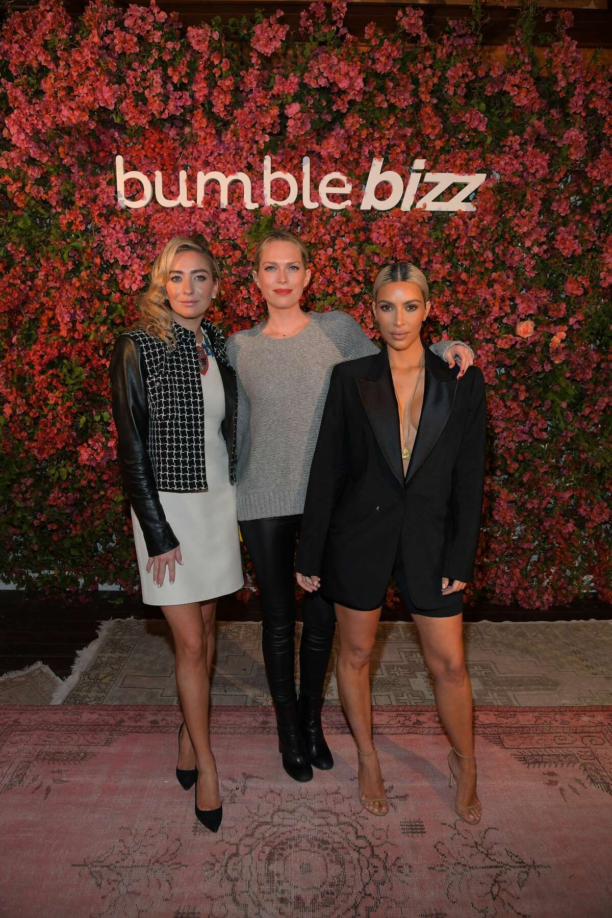 Whitney Wolfe Herd, Erin Foster, and Kim Kardashian attend Bumble Bizz Los Angeles Launch Dinner At Nobu Malibu at Nobu Malibu. Herd is known for living a lavish lifestyle and is regularly photographed with celebrities.