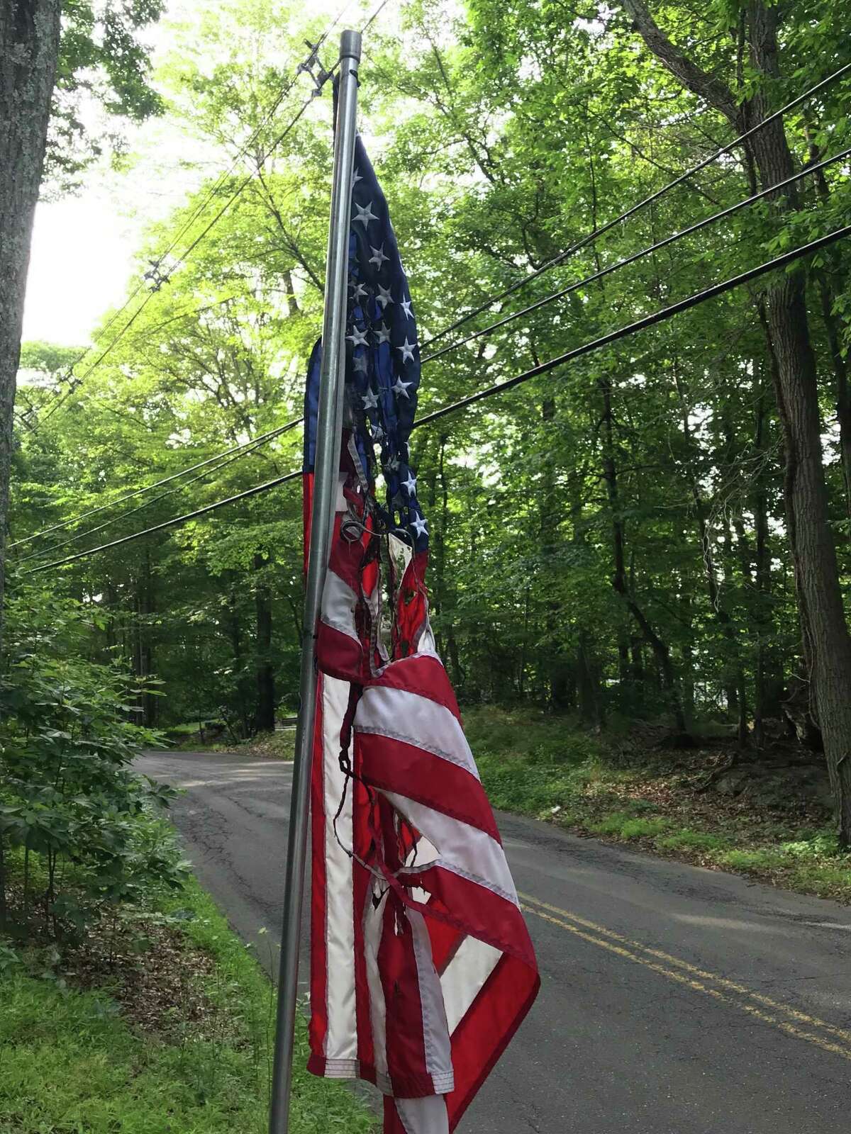 Two American flags were burned on Barrack Hill Road in Ridgefield during the overnight hours of Sunday, July 7, and Monday, July 8.
