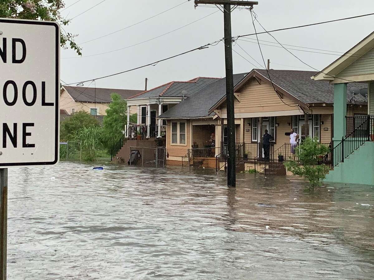 Photos show eerie scene as torrential rains flood New Orleans