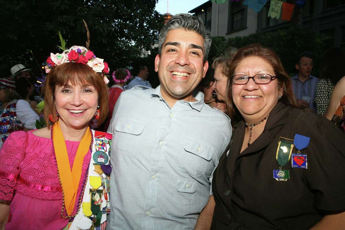 Xavier D. Urrutia, director of the San Antonio Parks and Recreation Department, stops for a photo at a Fiesta event in April 2009 with Marcie Ince, then president of the San Antonio Conservation Society (left), and Paula Stallcup, assistant director of the city’s communications and public relations. Urrutia is leaving the city after more than 25 years to become chief of staff for the Alamo Colleges chancellor.