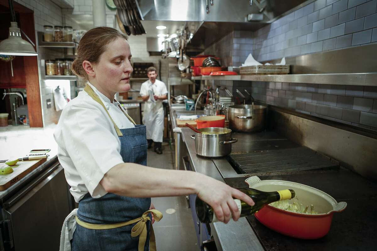 Chef April Bloomfield, chef/owner of Tosca Cafe, makes Pot-Roasted Artichokes, a recipe from her book, "A Girl and Her Greens," on Thursday, May 7, 2015 in San Francisco, Calif.