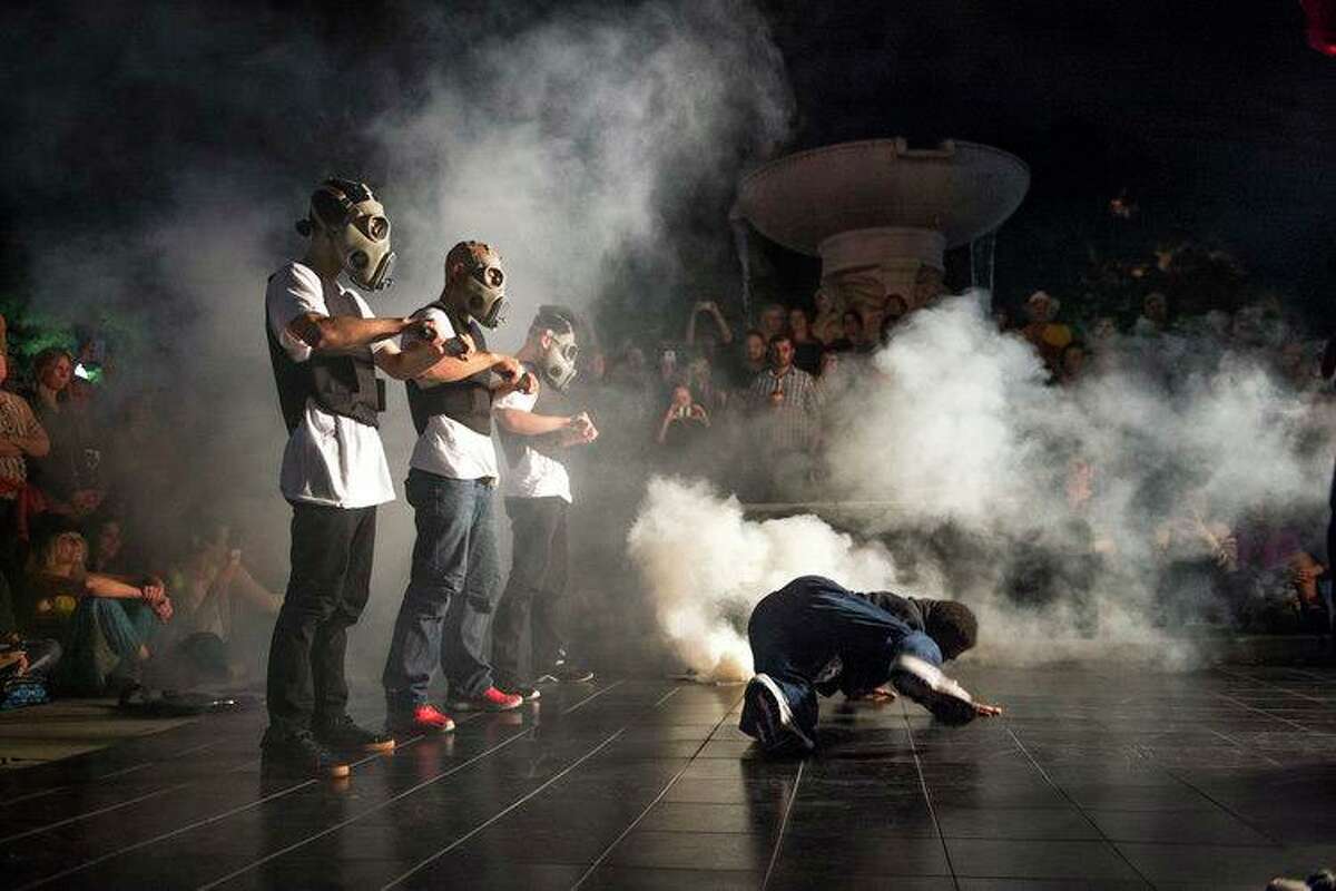 Jefferson Pinder (with Lionz of Zion) in his 2015 performance event "Dark Matter" in Washington, DC. Pinder will perform a new, site-specific piece inspired by Houston's 1917 Camp Logan Uprising on Thursday, July 11 as part of his "Red Summer Road Trip" project.