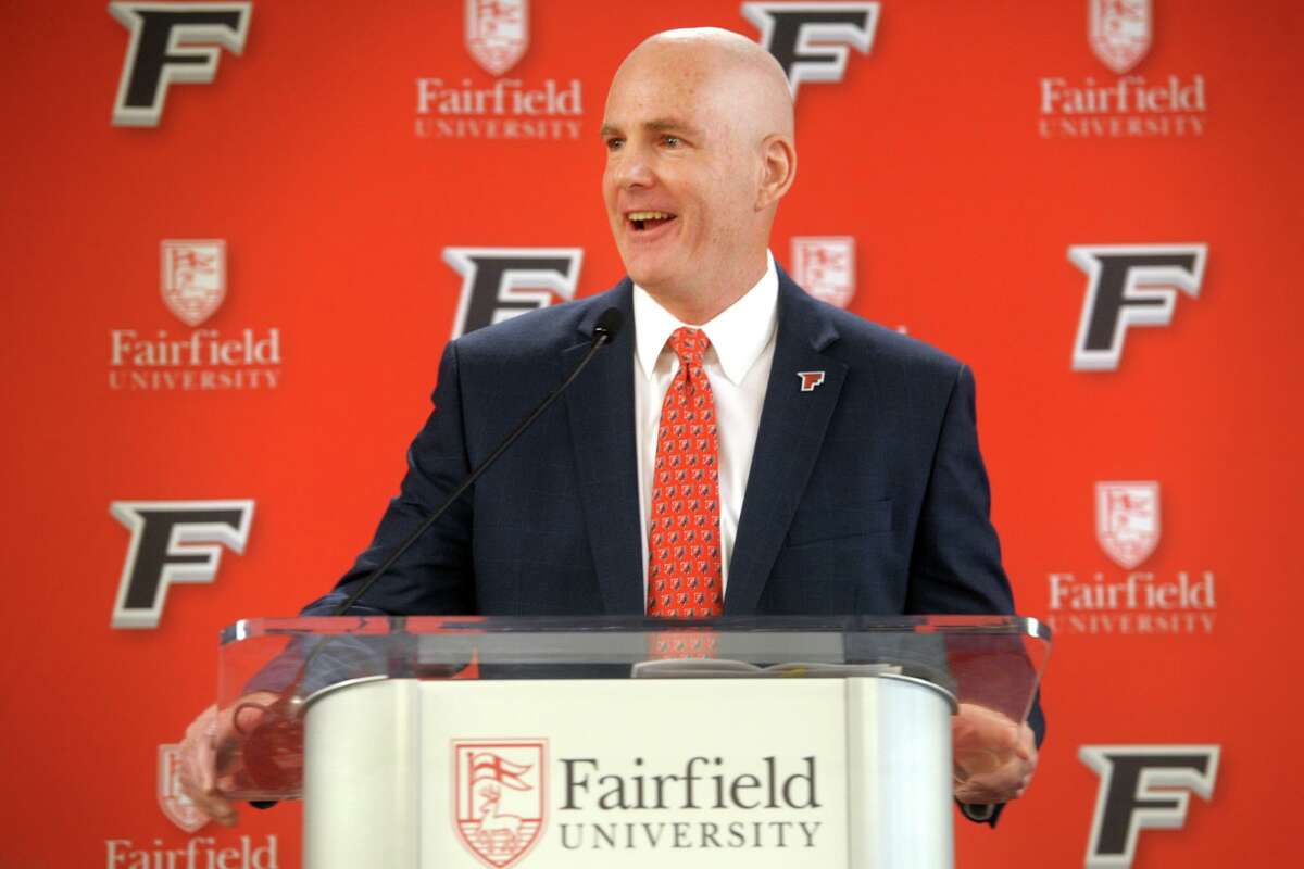Jay Young speaks after being introduced as the new men's basketball coach at Fairfield University on April 10 in Fairfield.