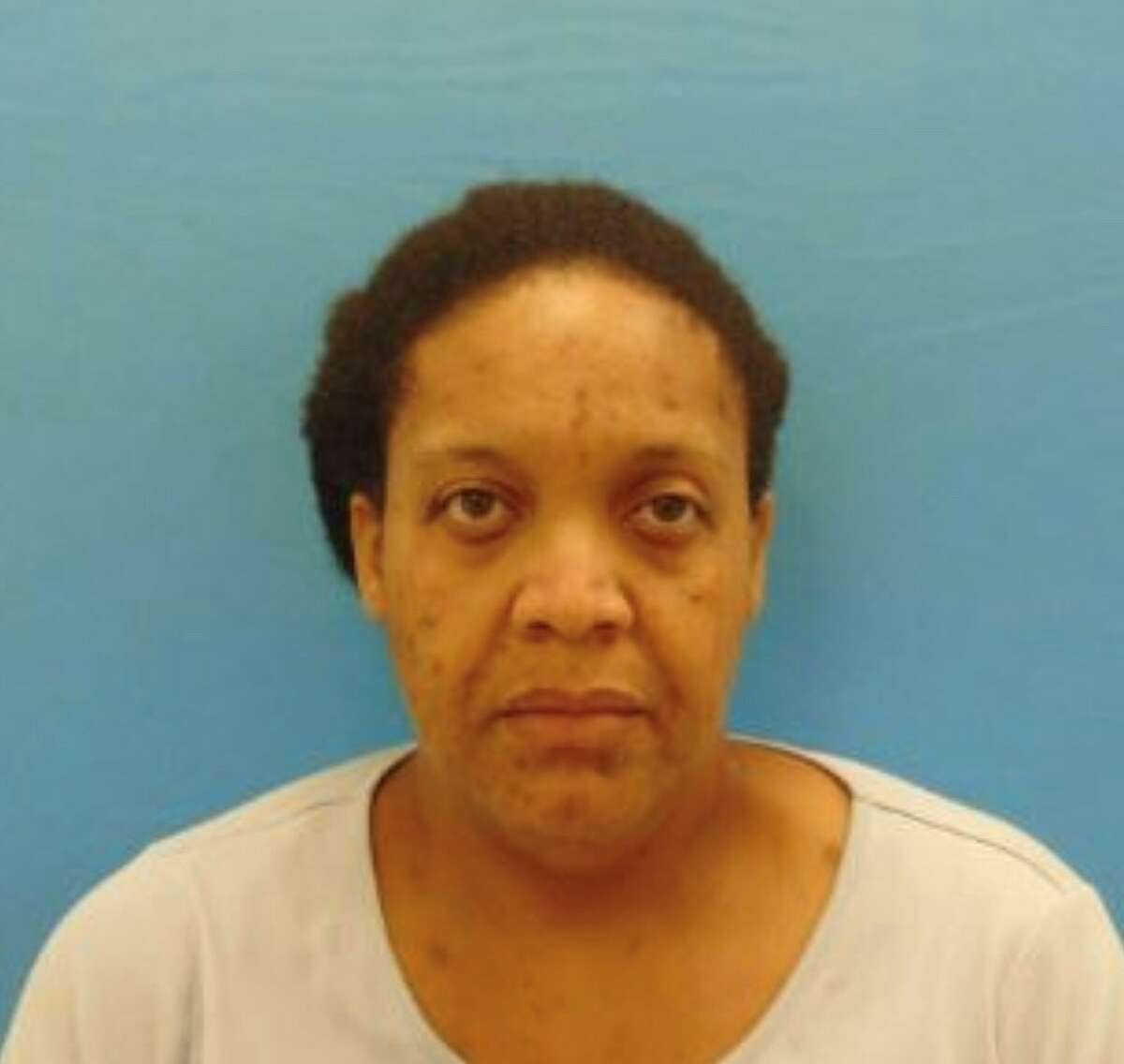 Former Seguin dispatcher Delissa Navonne Crayton, 47, was arrested on Wednesday, July 10, after the remains were found. The woman lived in the home with the remains of her mother in plain sight for three years, police said. The woman's teenage daughter also lived in the home. Crayton was arrested for injury to a child under the age of 15.Read more: Police: Seguin woman lived in home with mother's skeletal remains for three years
