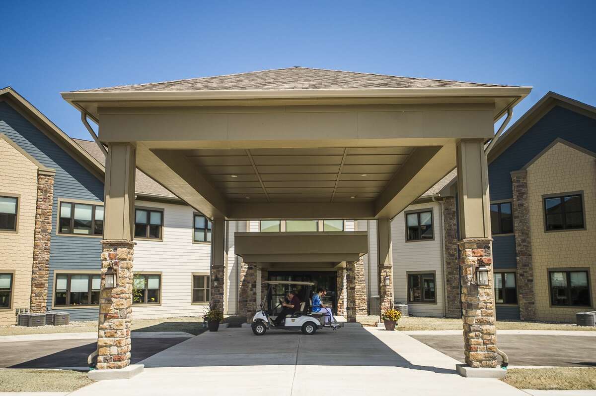 Guests take a tour of Primrose Retirement Community during an open house on Thursday, July 11, 2019 at 5600 Waldo Avenue. (Katy Kildee/kkildee@mdn.net)