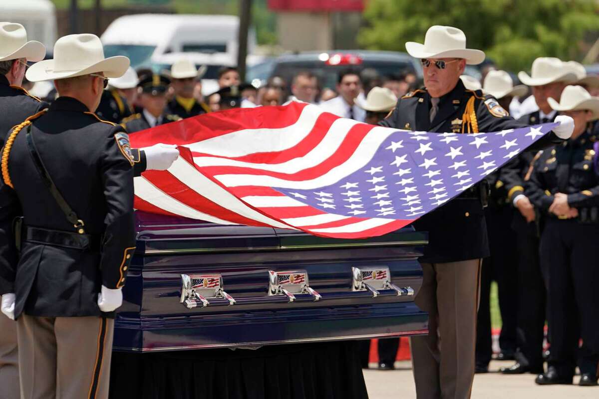 Harris County deputy buried in ‘sheriff’s office blue’ following his