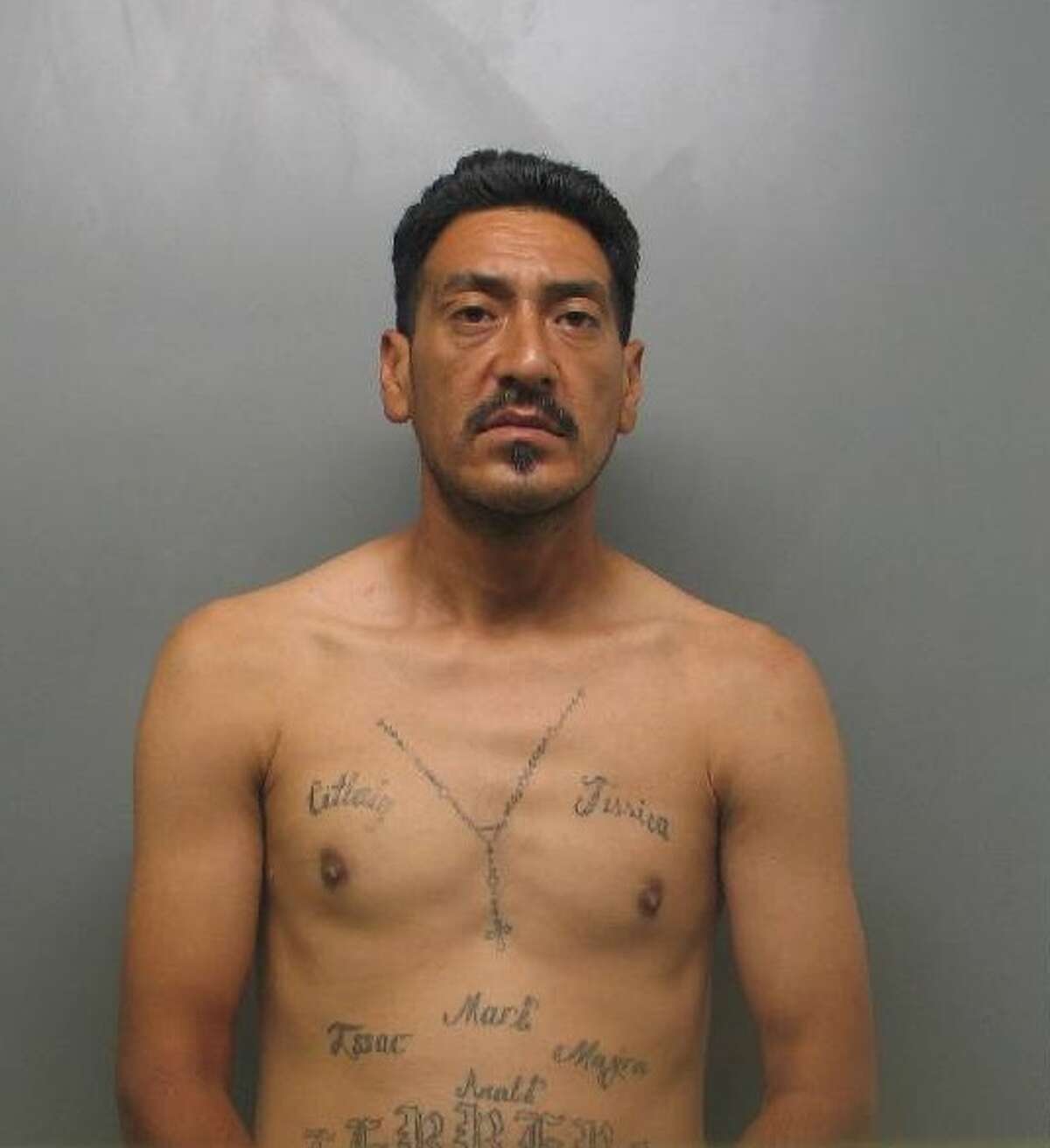 Alfonso Herrera, 42, was charged with assault family violence, theft from a Person, fail to identify by giving false or fictitious information, evading arrest and aggravated assault with a deadly weapon, family violence.
