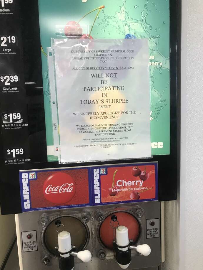A sign on a Slurpee machine in a 7-Eleven Berkeley at College Avenue and Russell Street indicates that none of the Berkeley franchise establishments are participating in the Free Slurpee Day. Photo: Michael Rosen / SFGate
