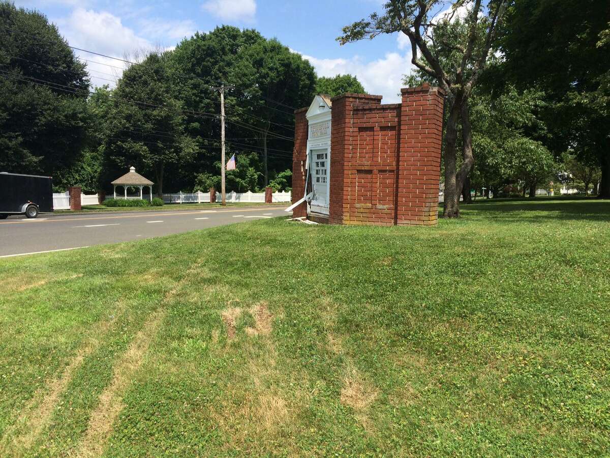 Town officials are looking into options for repairing the brick and glass sign in front of Town Hall that was damaged when struck by a vehicle Wednesday morning.