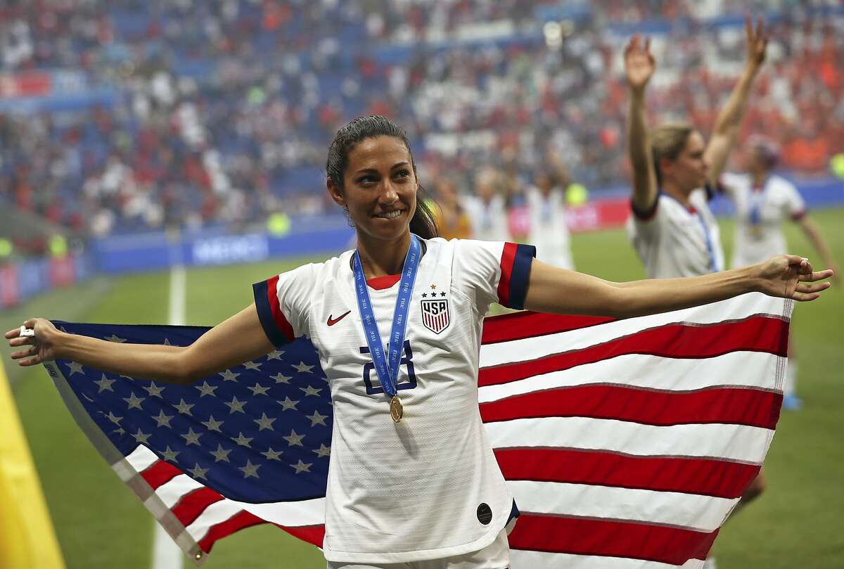 United States' Christen Press celebrates at the end of the Women's World Cup final soccer match between US and The Netherlands at the Stade de Lyon in Decines, outside Lyon, France, Sunday, July 7, 2019. The US defeated the Netherlands 2-0. (AP Photo/Francisco Seco)