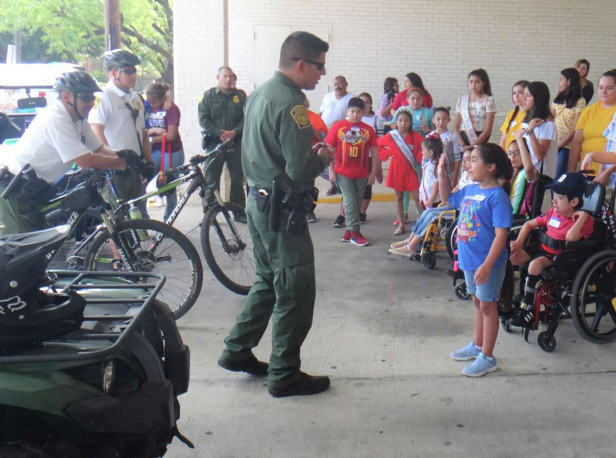 Border Patrol agents give kids first-hand look at their different vehicles and equipment.