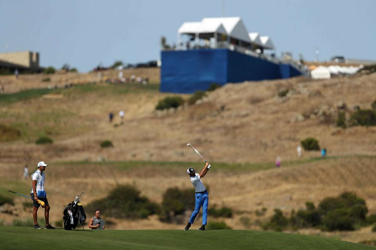 Golden State Warriors' Stephen Curry hits a shot on 3rd hole during 2nd round of Ellie Mae Classic at TPC Stonebrae in Hayward, Calif. on Friday, August 10, 2018.