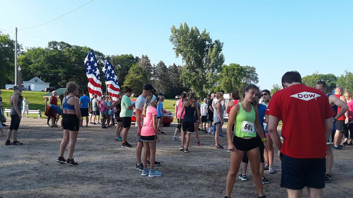 About 200 people took part in the ninth annual Coach Cole 5K on Saturday morning, July 13, starting and ending at Sanford Village Park.