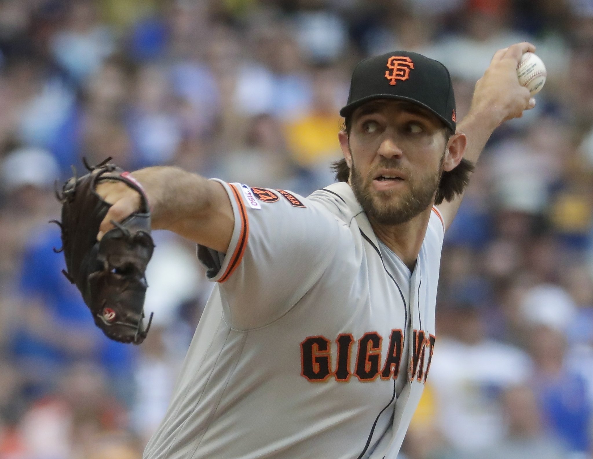 Madison Bumgarner and Buster Posey by Jamie Squire