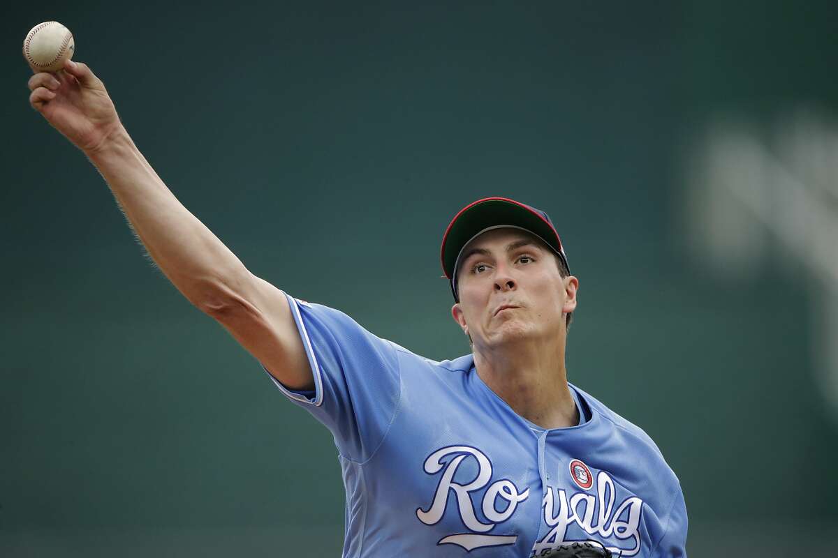 Kansas City Royals starting pitcher Homer Bailey throws during the first inning of a baseball game against the Cleveland Indians Thursday, July 4, 2019, in Kansas City, Mo. (AP Photo/Charlie Riedel)