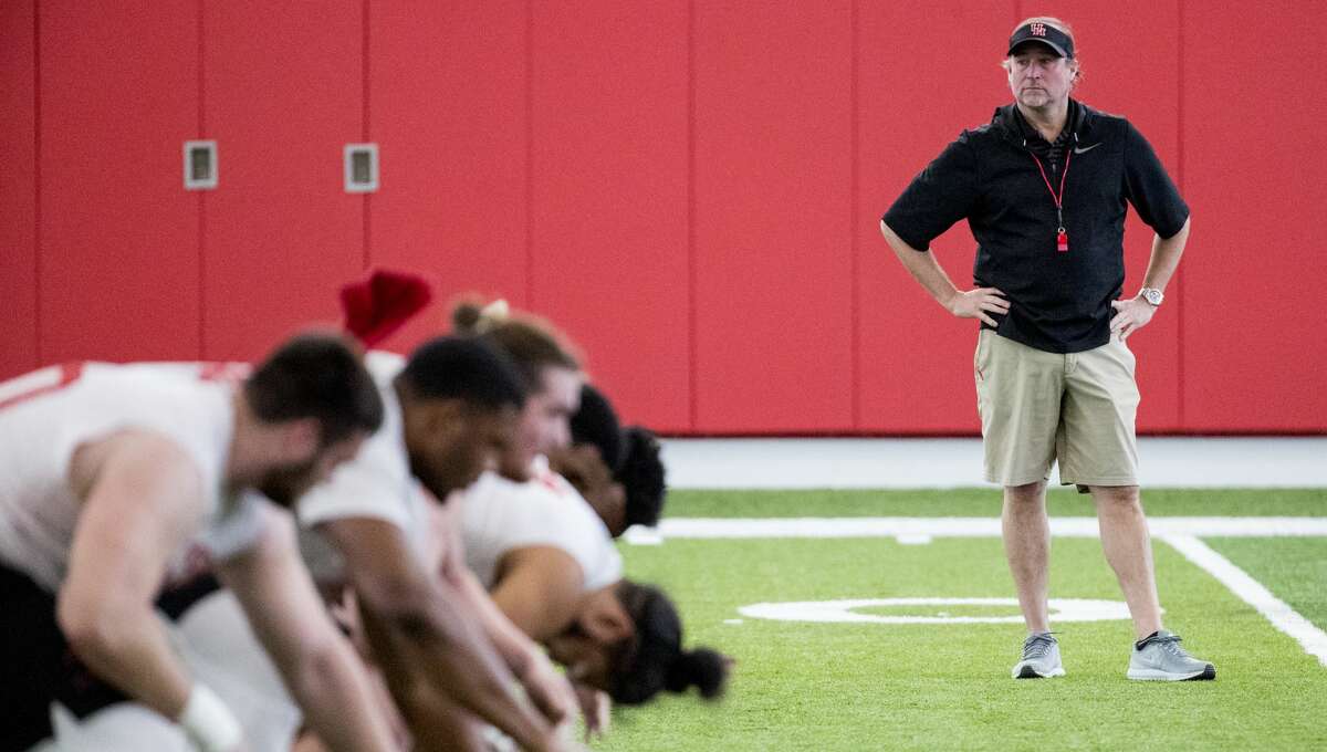 University of Houston head coach Dana Holgorsen watches his player run through a workout during the first day of spring practice on Tuesday, March 19, 2019, in Houston.