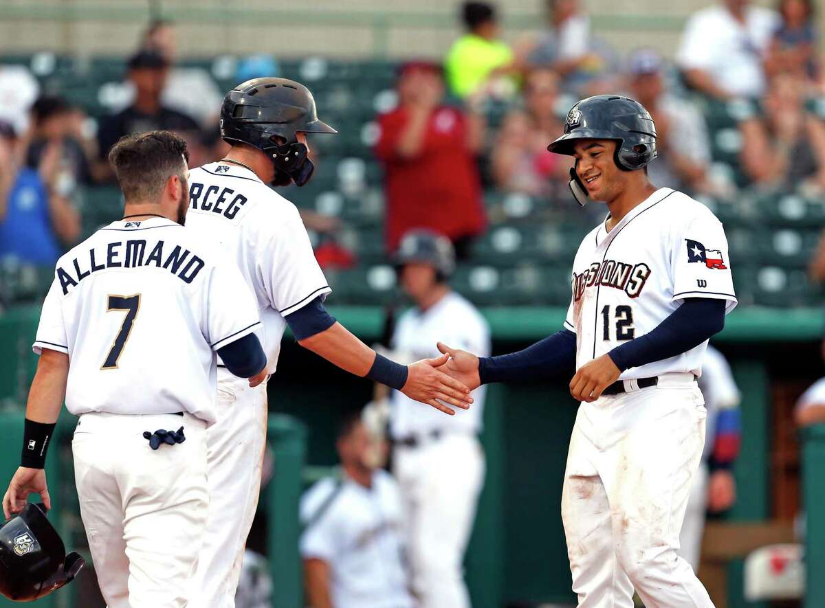 Missions Trent Grisham is congratulated by Lucas Erceg and Blake Allemand after his two run HR in the fourth inning. Omaha v Missions on Sunday, July 14,2019 at Wolff Stadium.