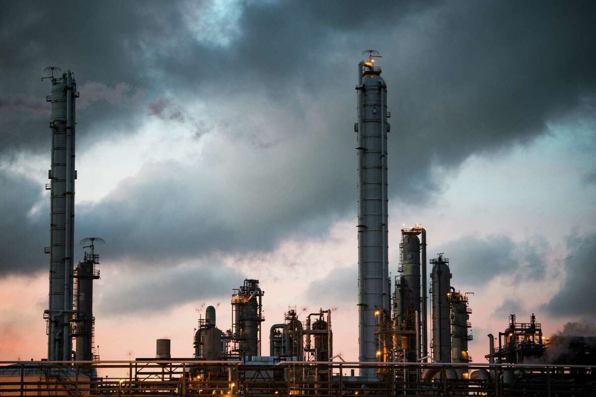 The evening sun sets over the BASF TOTAL Petrochemicals LLC refinery unit in Port Arthur, Texas. (Brandon Thibodeaux/The New York Times)