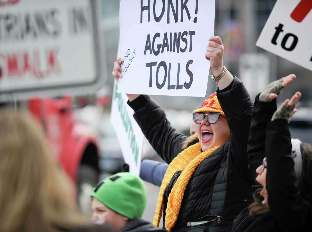 Hilary Gunn of Greenwich joined approximately 100 activists from a anti-toll group No Tolls CT, at a protest in front of the Government Center on Feb. 23. Gov. Ned Lamont said Monday he isn’t giving up his fight to implement tolls on Connecticut’s highways despite uncertainty from legislative leadership.