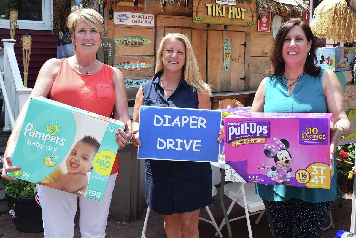 From left, State Rep. Laura Devlin, State Rep. Brenda Kupchick and Operation Hope Executive Director Carla Miklos.