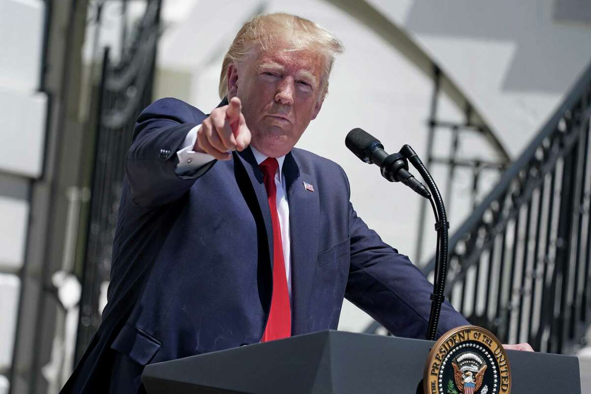 WASHINGTON, DC - JULY 15: U.S. President Donald Trump takes questions from reporters during his 'Made In America' product showcase at the White House July 15, 2019 in Washington, DC. Trump talked with American business owners during the 3rd annual showcase, one day after Tweeting that four Democratic congresswomen of color should go back to their own countries. (Photo by Chip Somodevilla/Getty Images)