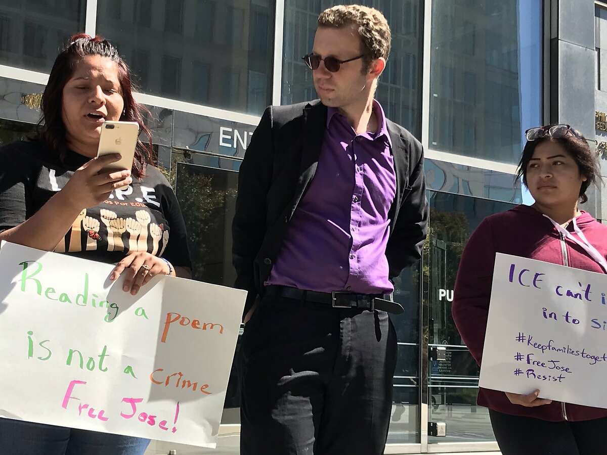 Edith Mata, a Bakersfield College student, speaks to a circle of supporters on Monday outside the Philip Burton Federal Building in San Francisco, Calif. She is the girlfriend of Jose Bello, a Bakersfield activist detained by ICE two days after performing a poem criticizing immigration policies.