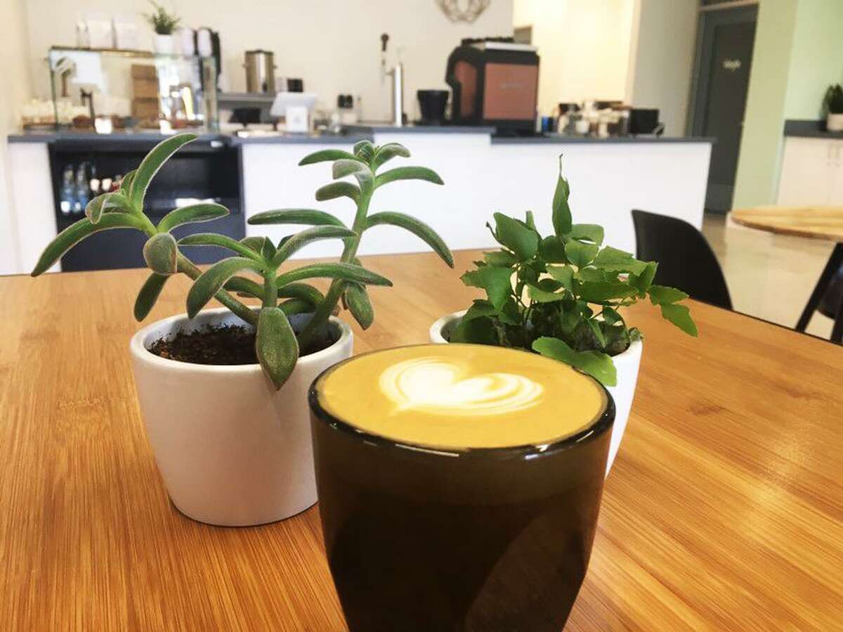 A freshly served cup of coffee at Blüm Coffee and Tea, which is located at 8522 Broadway inside the Paradox building.